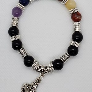 Chakra bracelet with onyx and heart charm. Black Onyx, Amethyst, Lapis Lazulite, Blue Dot Jasper, Aventurine, Tigers Eye, Yellow Jade, and Red Jasper.