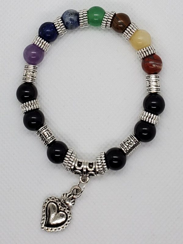 Chakra bracelet with onyx and heart charm. Black Onyx, Amethyst, Lapis Lazulite, Blue Dot Jasper, Aventurine, Tigers Eye, Yellow Jade, and Red Jasper.