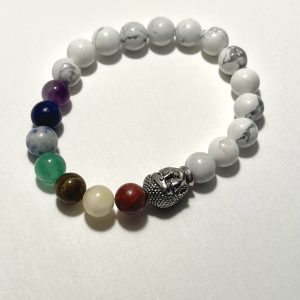 Chakra bracelet with buddha charm and White Howlite, Amethyst, Lapis Lazuli, Blue Dot Jasper, Aventurine, Tigers Eye, Yellow Jade, and Red Jasper.