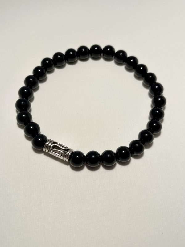 Black Onyx with silver charm bracelet.