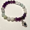 Aquamarine, Quartz, Amethyst, Moonstone, and Evil Eye Charm Bracelet.