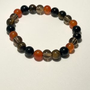 Carnelian, Smokey Quartz, Tourmaline, and Tiger's Eye: Capricorn Energy Bracelet.